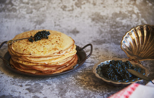 A plate of pancakes with Siberian sturgeon caviar.