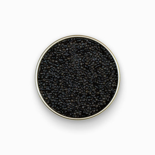 Paddlefish black caviar in an open metal tin 4.4 oz.
